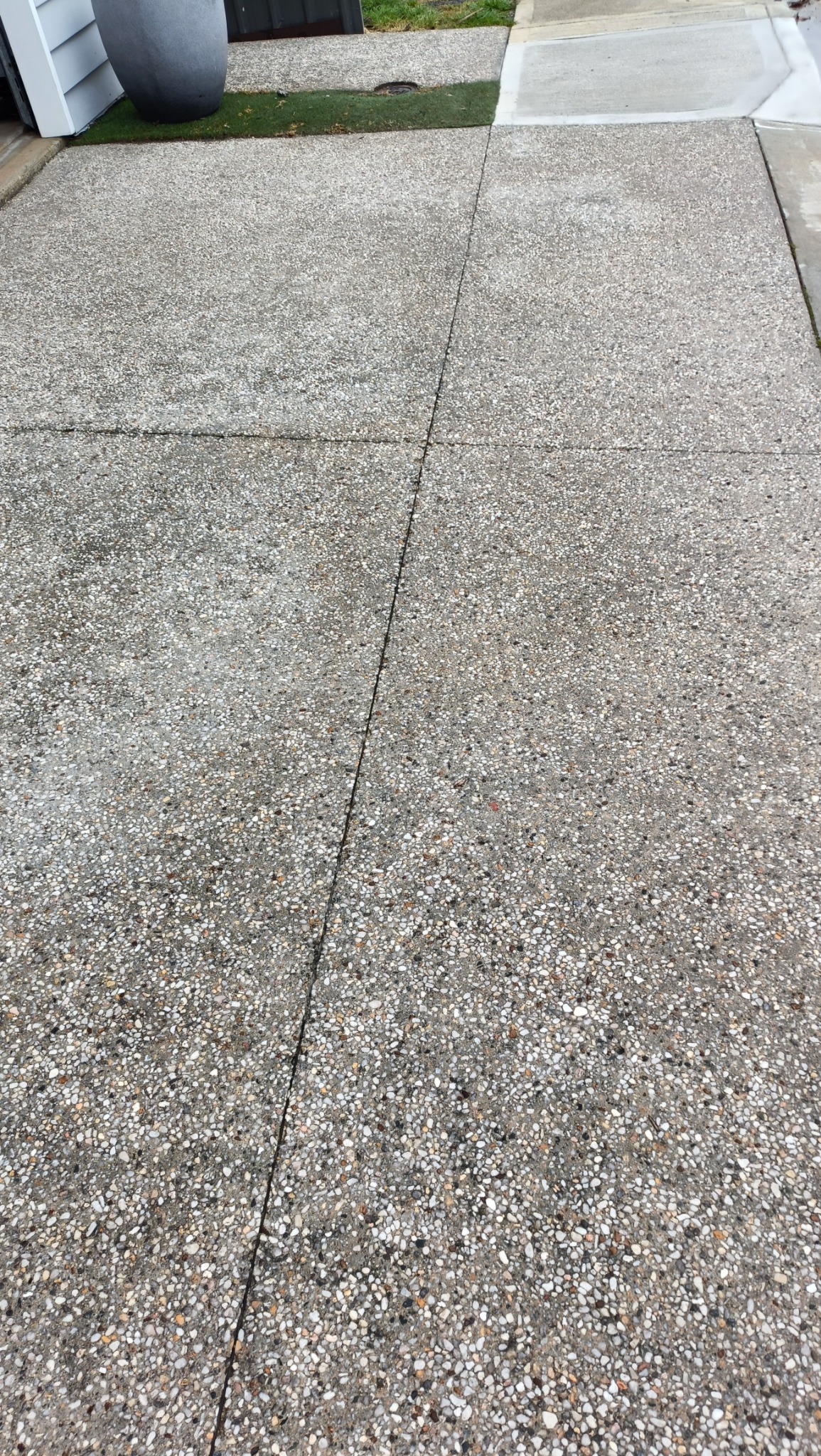 Pressure washed exposed aggregate driveway